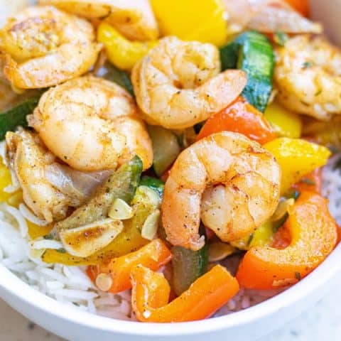 Garlic Thyme Shrimp and Veggies in bowl with rice