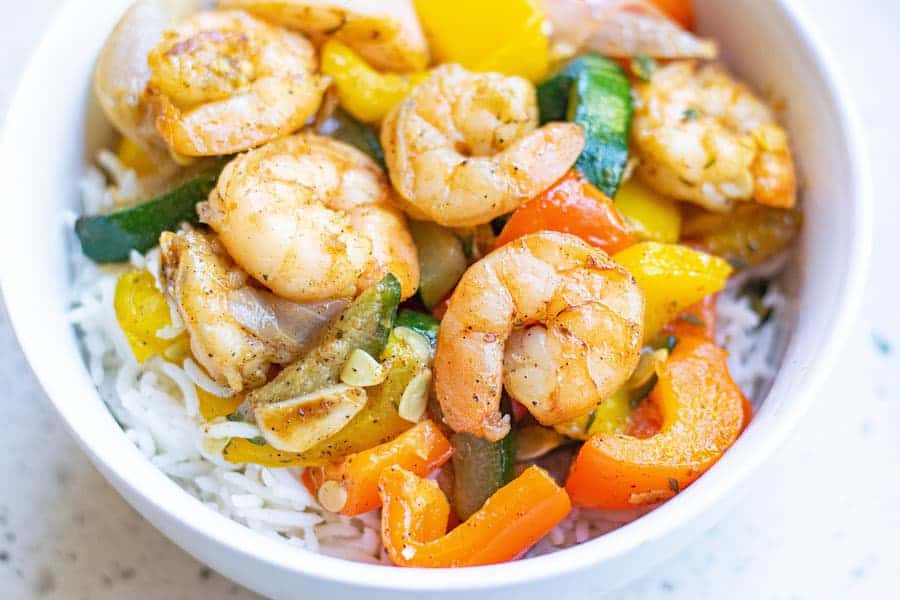 Garlic Thyme Shrimp and Veggies in bowl with rice