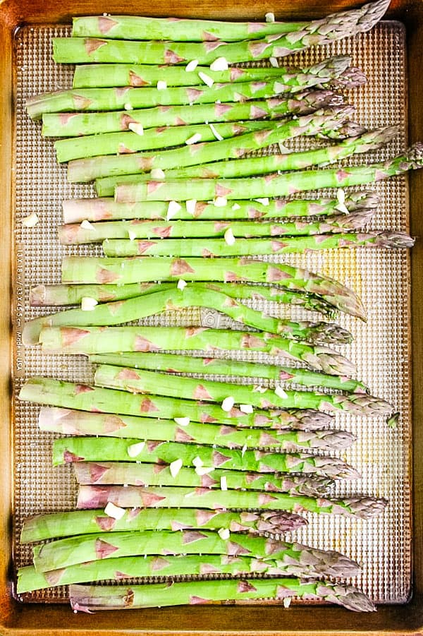 Sheet Pan Roasted Asparagus uncooked on sheet pan