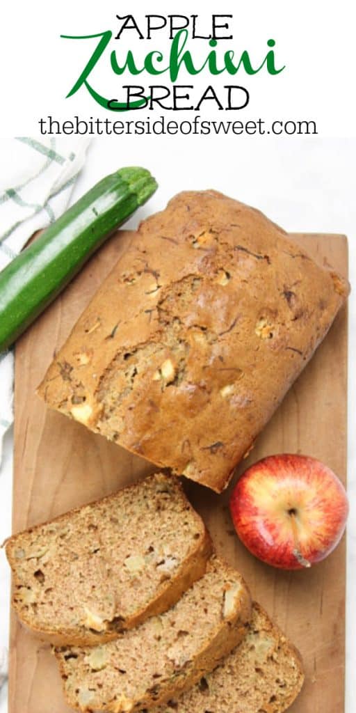 Apple Zucchini Bread on brown cutting board with apple and zucchini