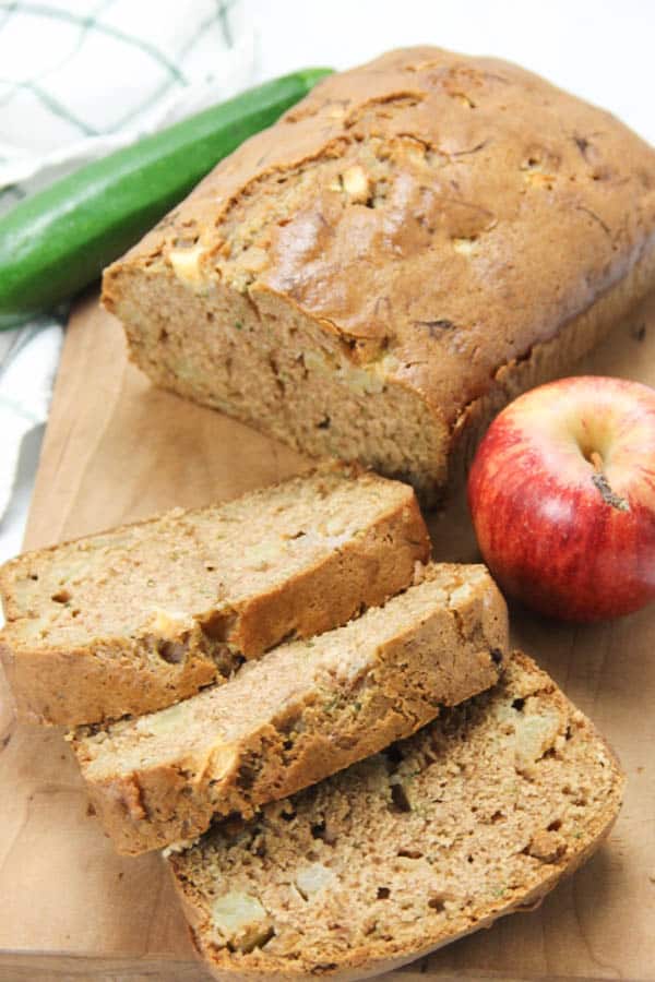 Apple Zucchini Bread on brown cutting board