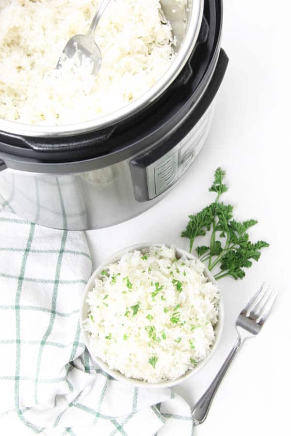 Instant Pot Basmati Rice in white bowl with fork