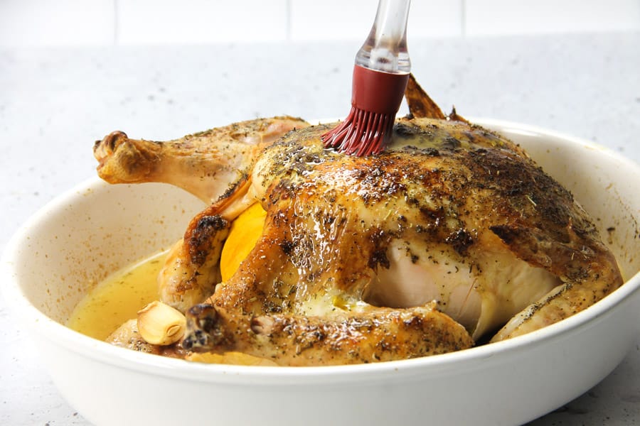 Oven Baked Whole Chicken brushed with olive oil