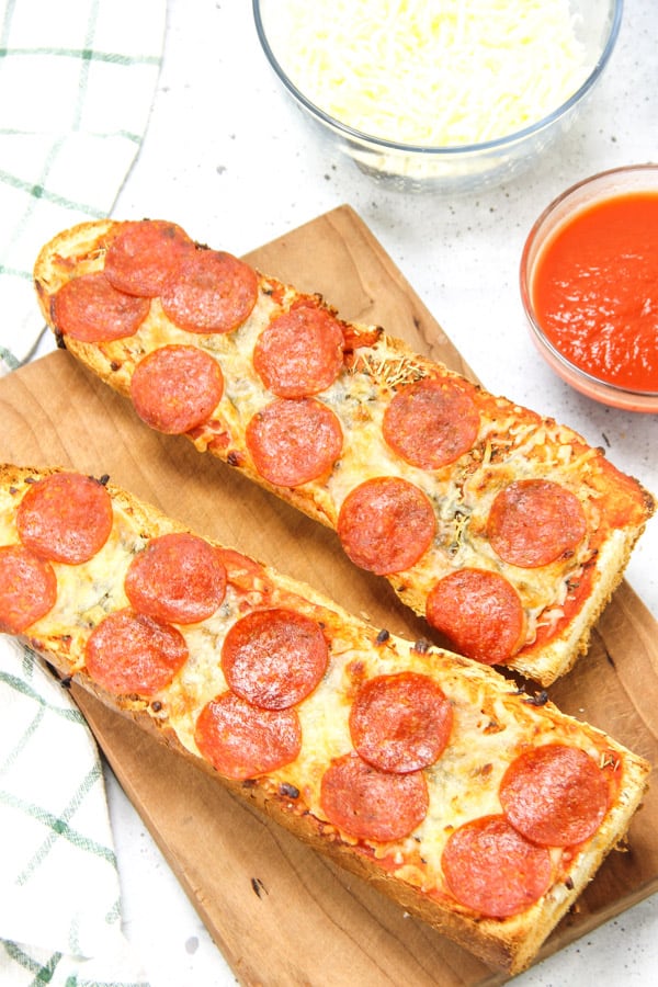 Pepperoni French Bread Pizza on cutting board