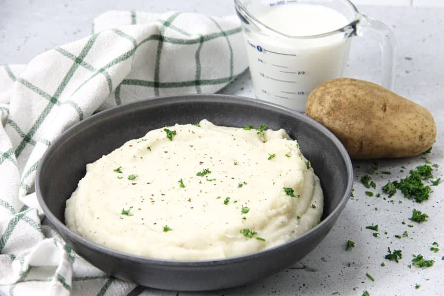 Pressure Cooker Potatoes with Gravy in gray bowl