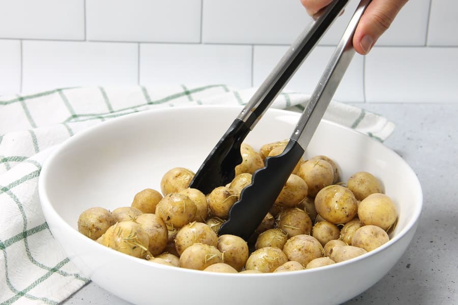 Roasted Rosemary Potatoes tossed in bowl