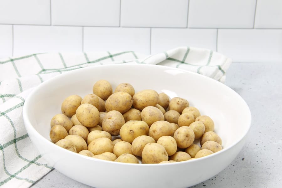 Roasted Rosemary Potatoes uncooked in bowl