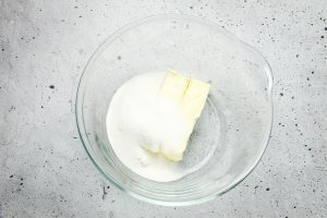 Butter and sugar in glass bowl