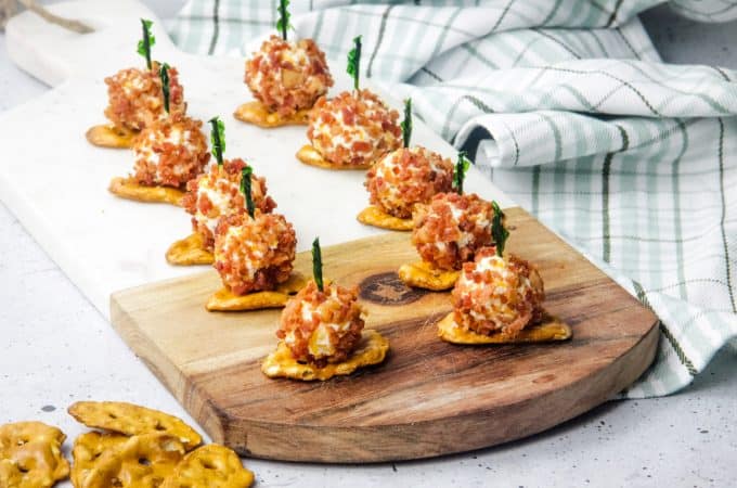 Mini Bacon Ranch Cheeseballs on pretzels with toothpick