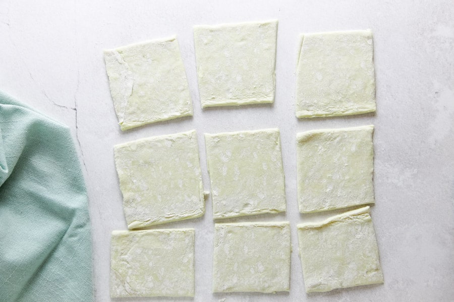 cut beignets on white background.