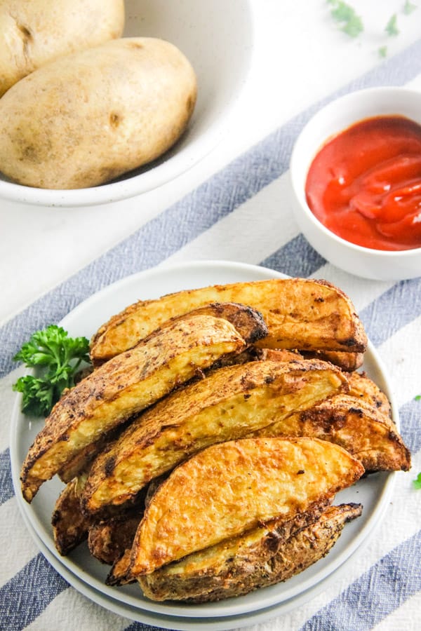 Air Fryer Potato Wedges on plate with parsley