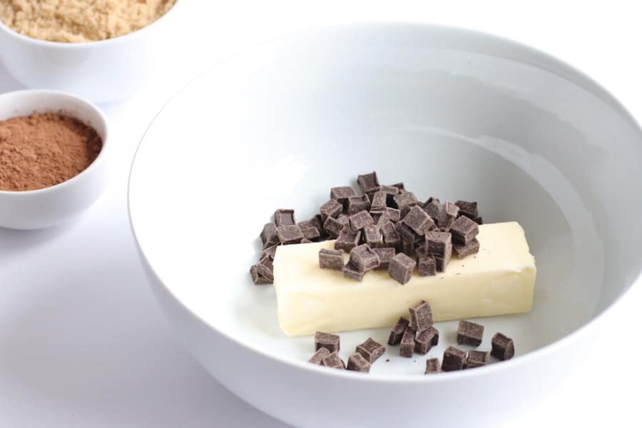 butter and chocolate chips in white bowl.