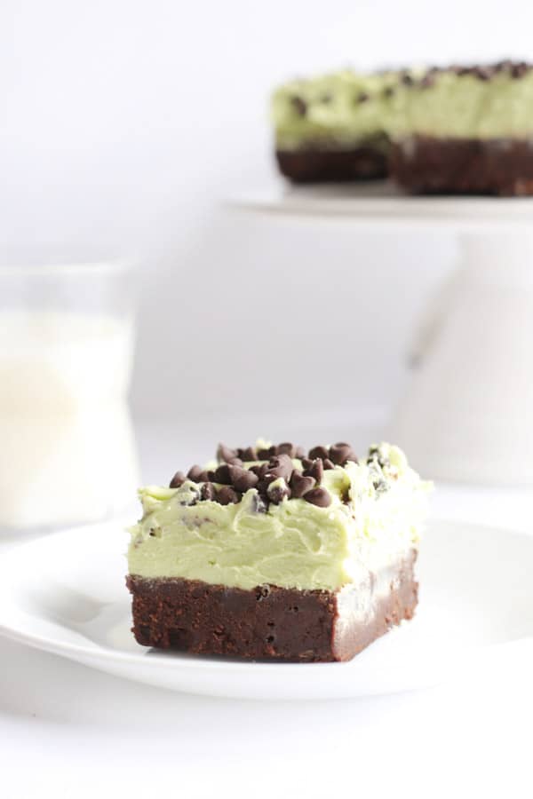 Mint Chocolate Chip Brownies single slice on white plate.