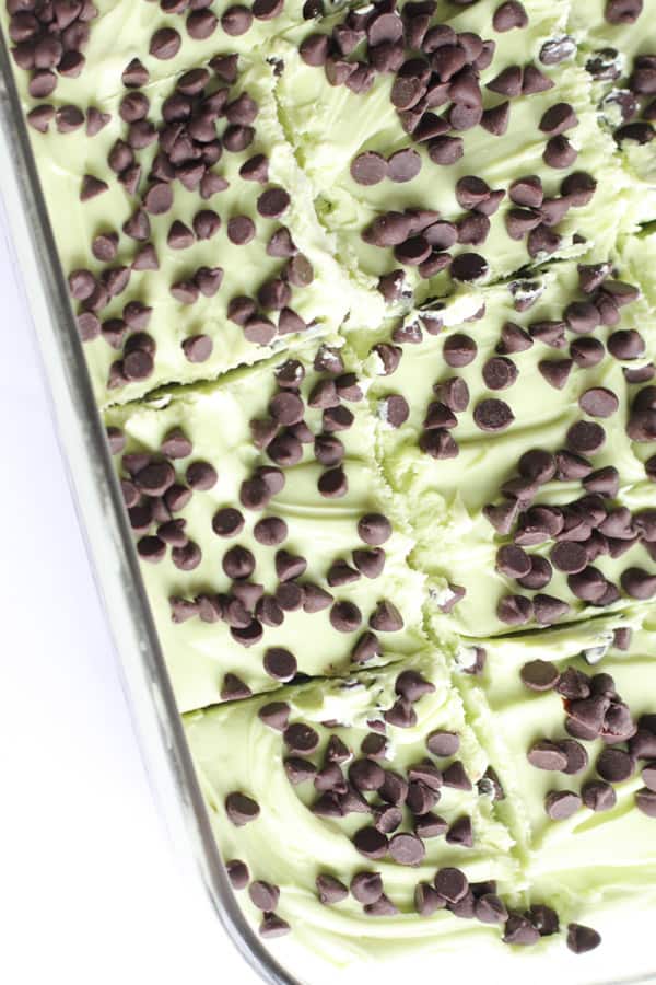 Mint Chocolate Chip Brownies cut into pieces in dish.