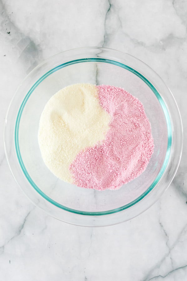 powdered milk and strawberry milk in bowl