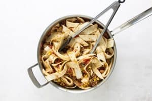 tortilla strips in skillet.