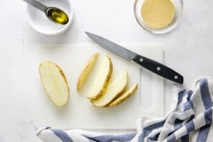 cut potatoes on cutting board