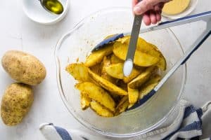 potatoes in bowl with salt