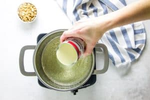 pouring in sweetened condensed milk
