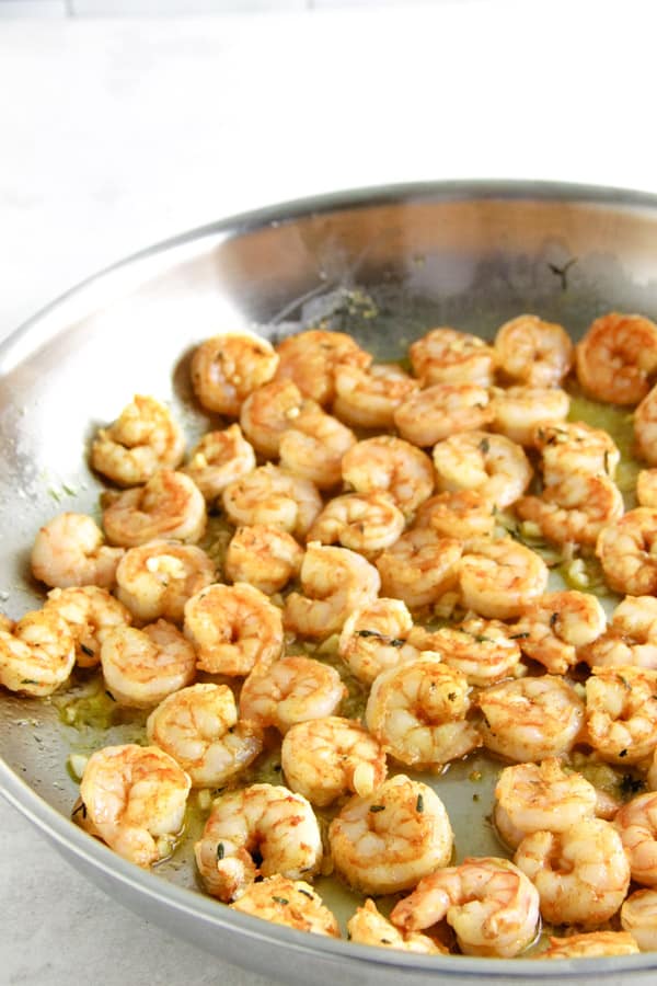 Spicy Garlic Thyme Shrimp cooked in pan.