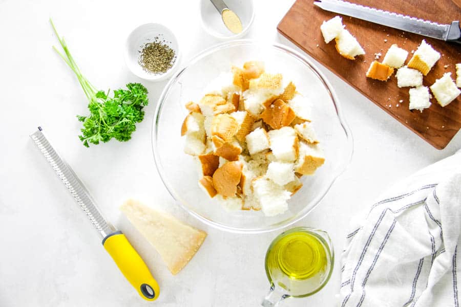 cubed bread in glass bowl.