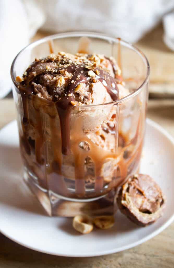 Ferrero Rocher Ice Cream topped with chocolate and nuts.