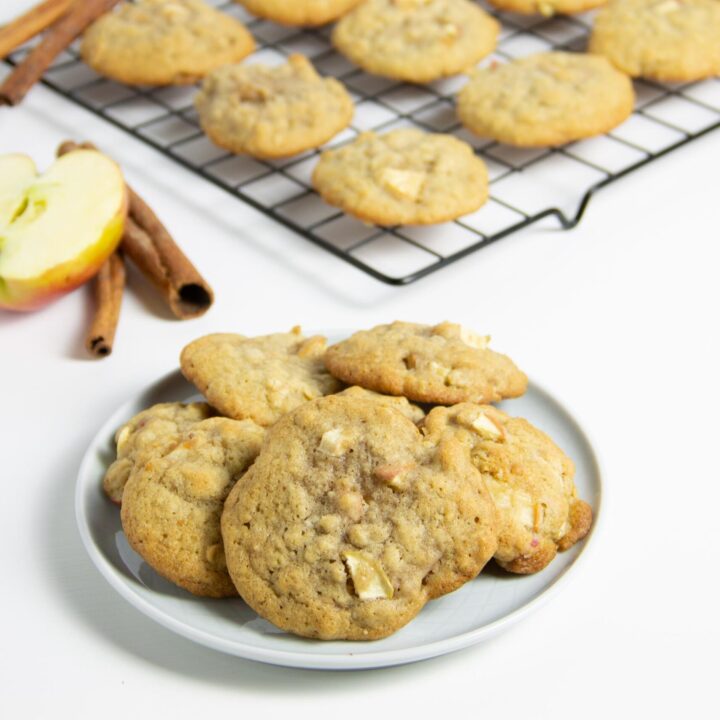 Apple Cinnamon Oatmeal Cookies stacked on plate.