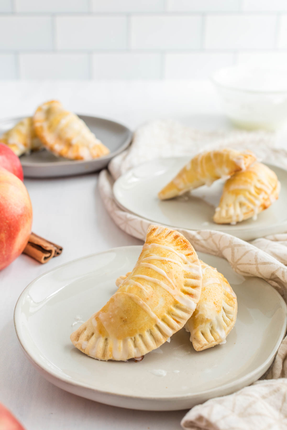 Apple Pie Turnovers on white plate.