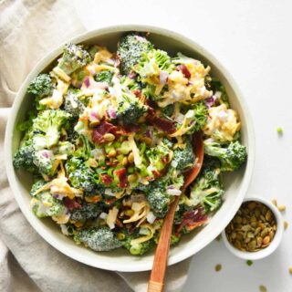 Easy Broccoli Salad in bowl topped with bacon.