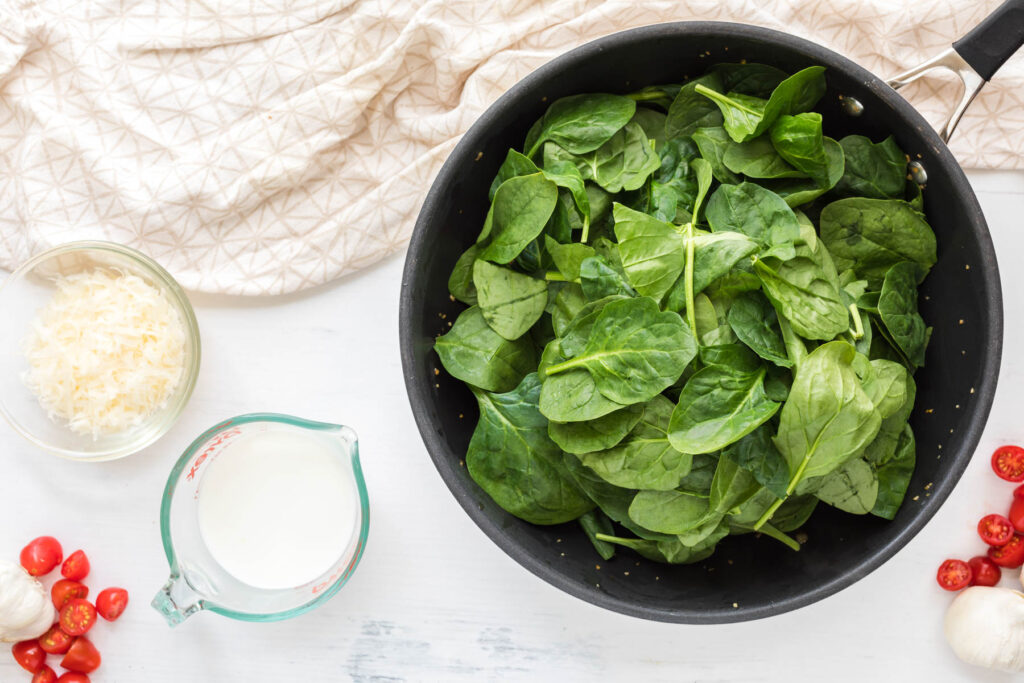 spinach added to saute pan.