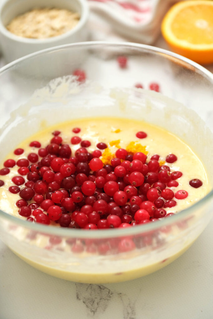 cranberries and zest in bowl.