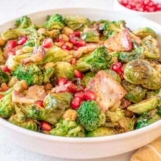 Warm Brussels Sprouts Salad in white bowl.