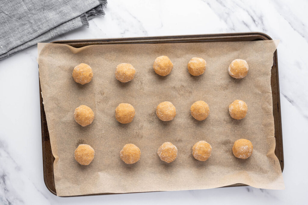 uncooked cookies on tray.