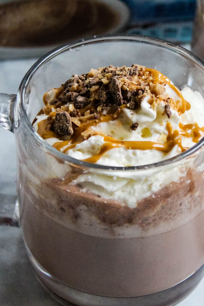 Peanut Butter Hot Chocolate in glass mug.