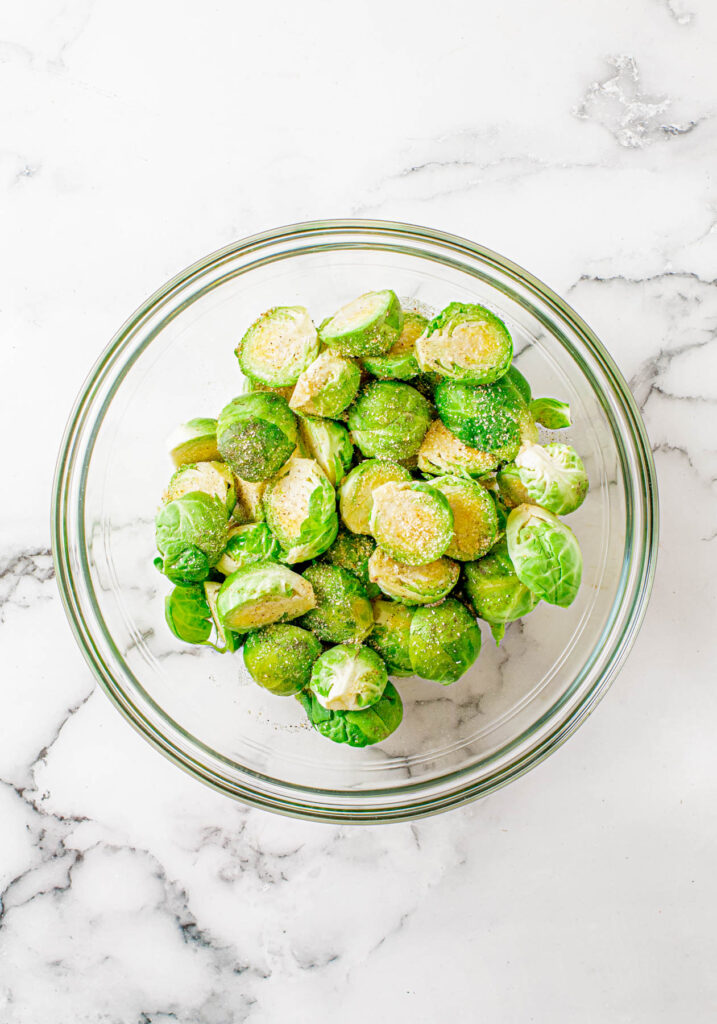 uncooked sprouts in glass bowl.