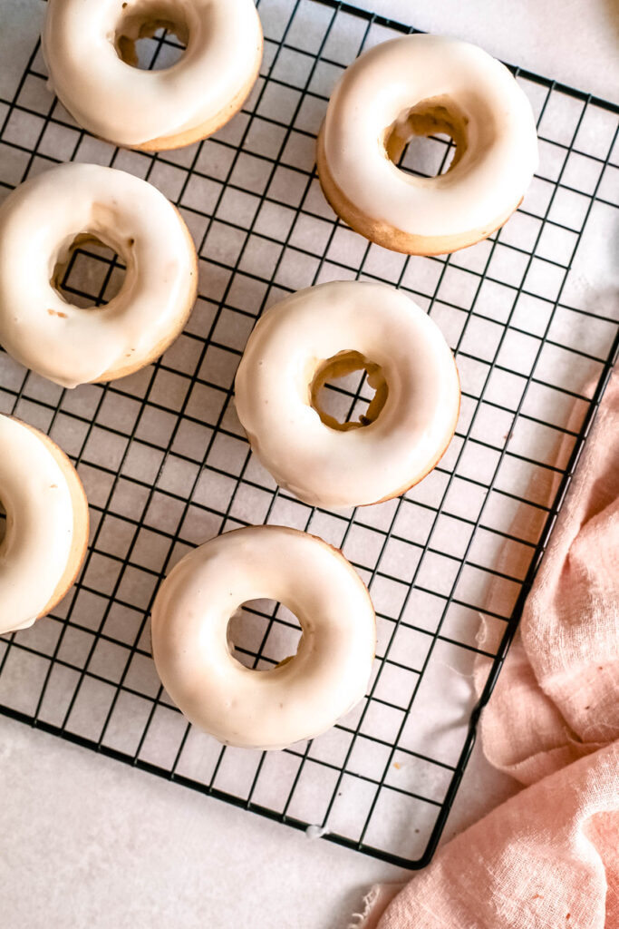 Baked Lemon Donuts on wire cooling rack.