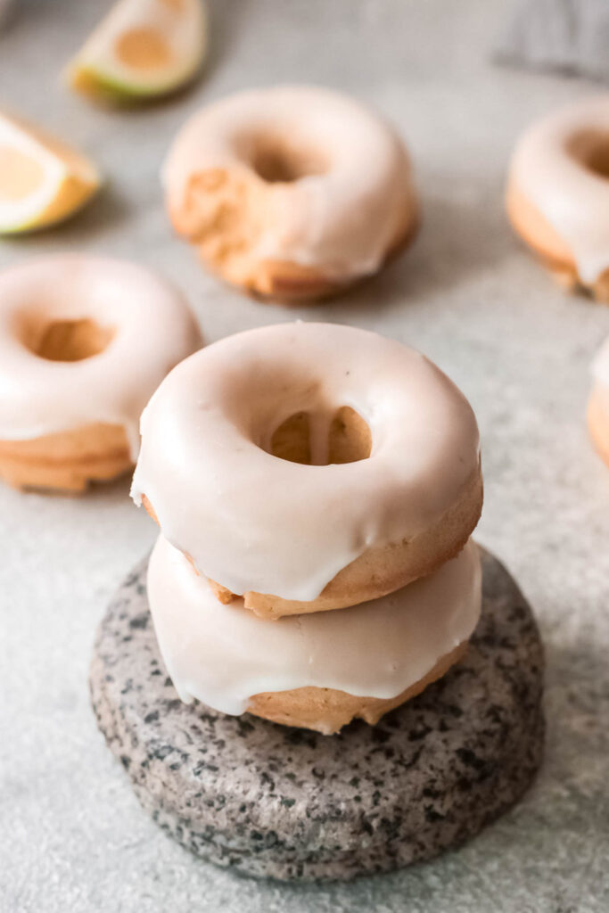 Baked Lemon Donuts stacked.