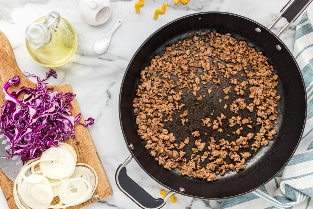 cooked sausage in skillet.