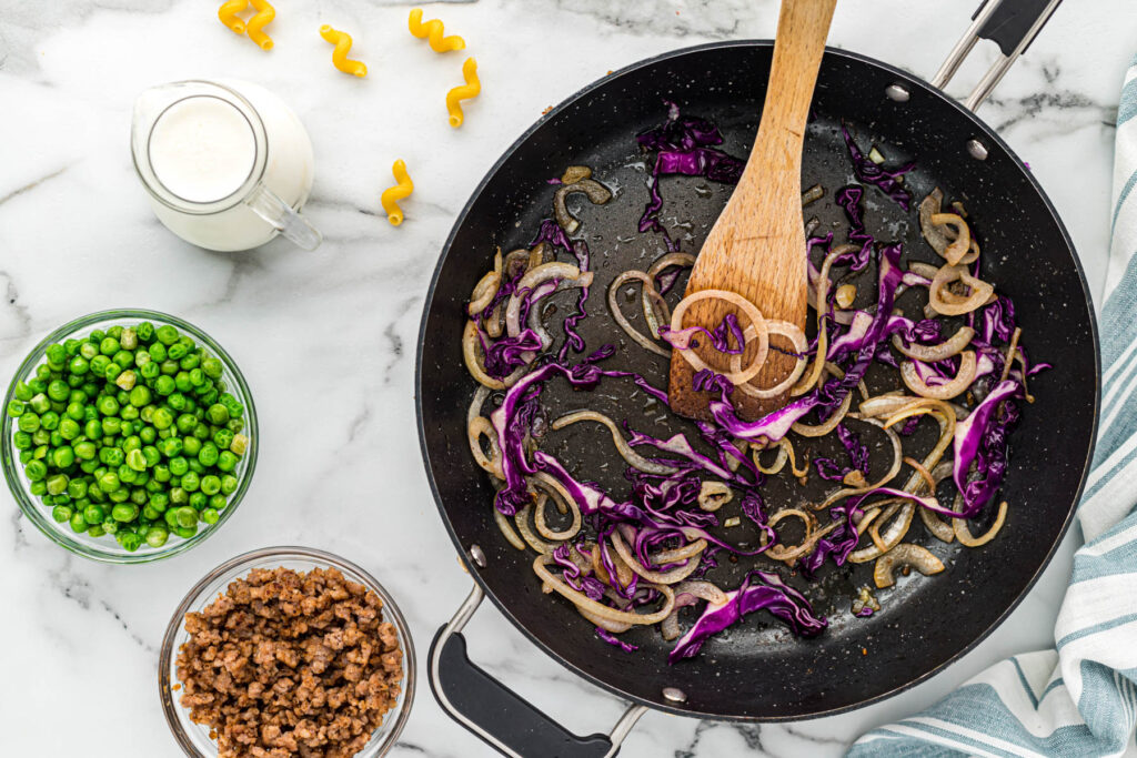 cooked cabbage and onions in skillet.