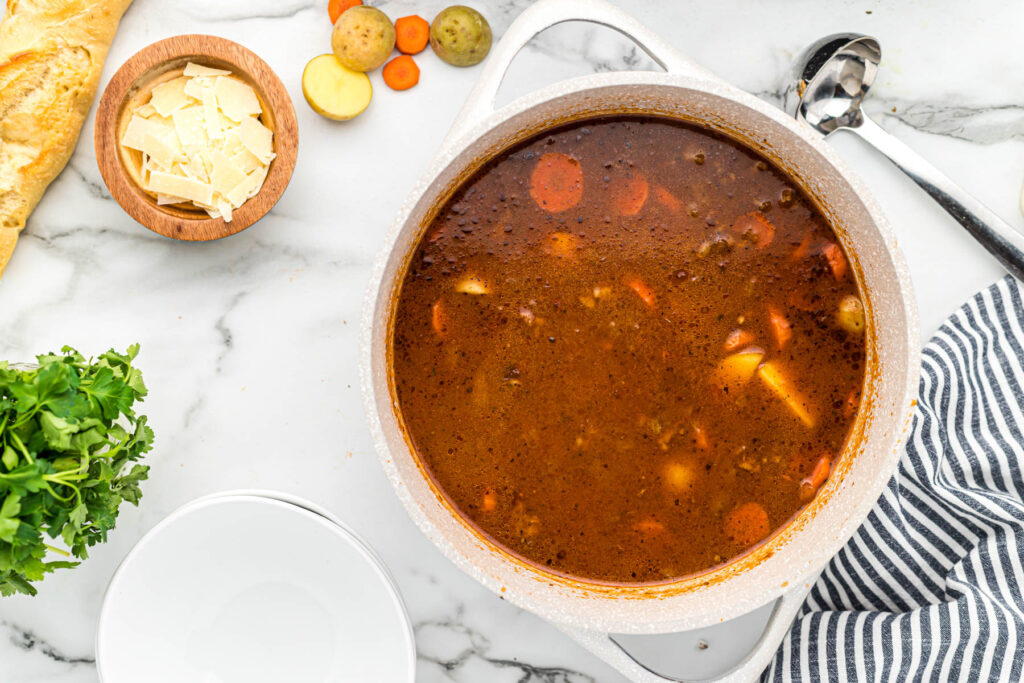 soup mixed in pot.