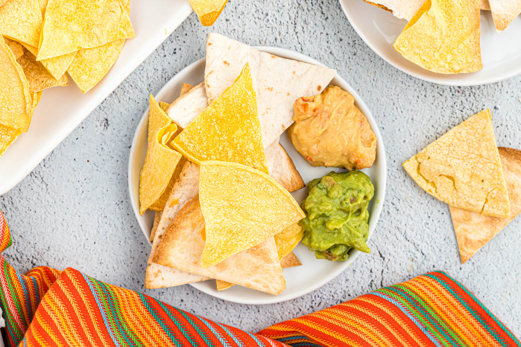 Air Fryer Tortilla Chips 2 WAYS on white plate.