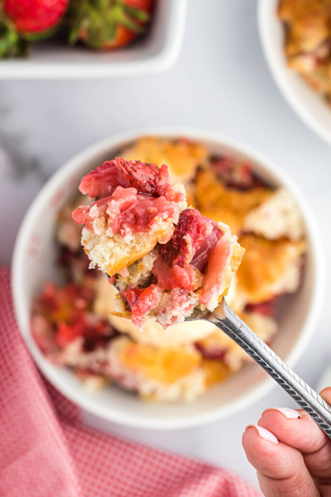 Strawberry Cobbler in spoon.