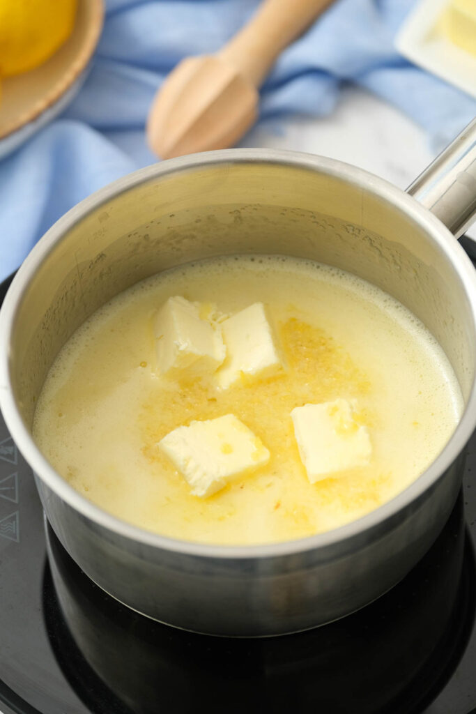 butter and sauce in pot.
