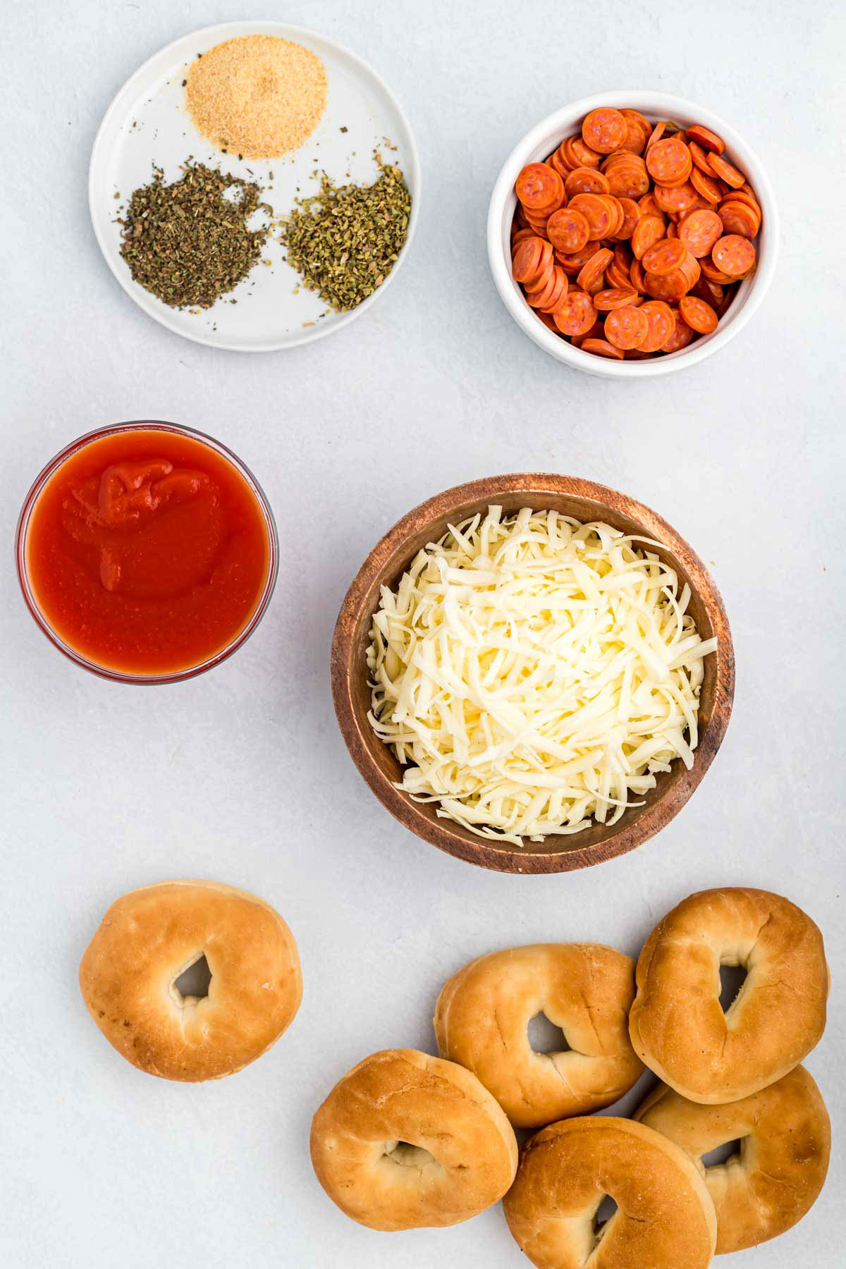 ingredients for Air Fryer Bagel Bites on white background.