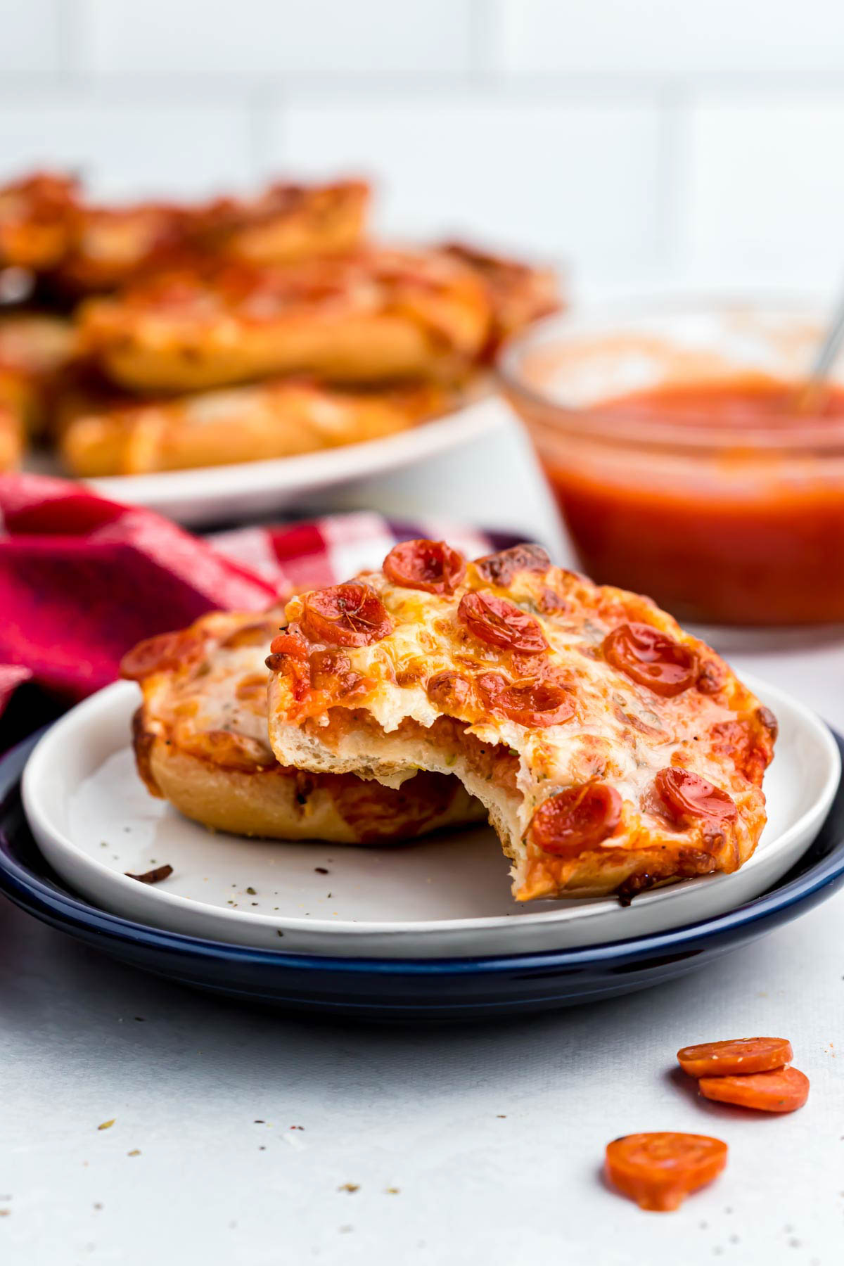 air fryer bagel bites with bite marks.