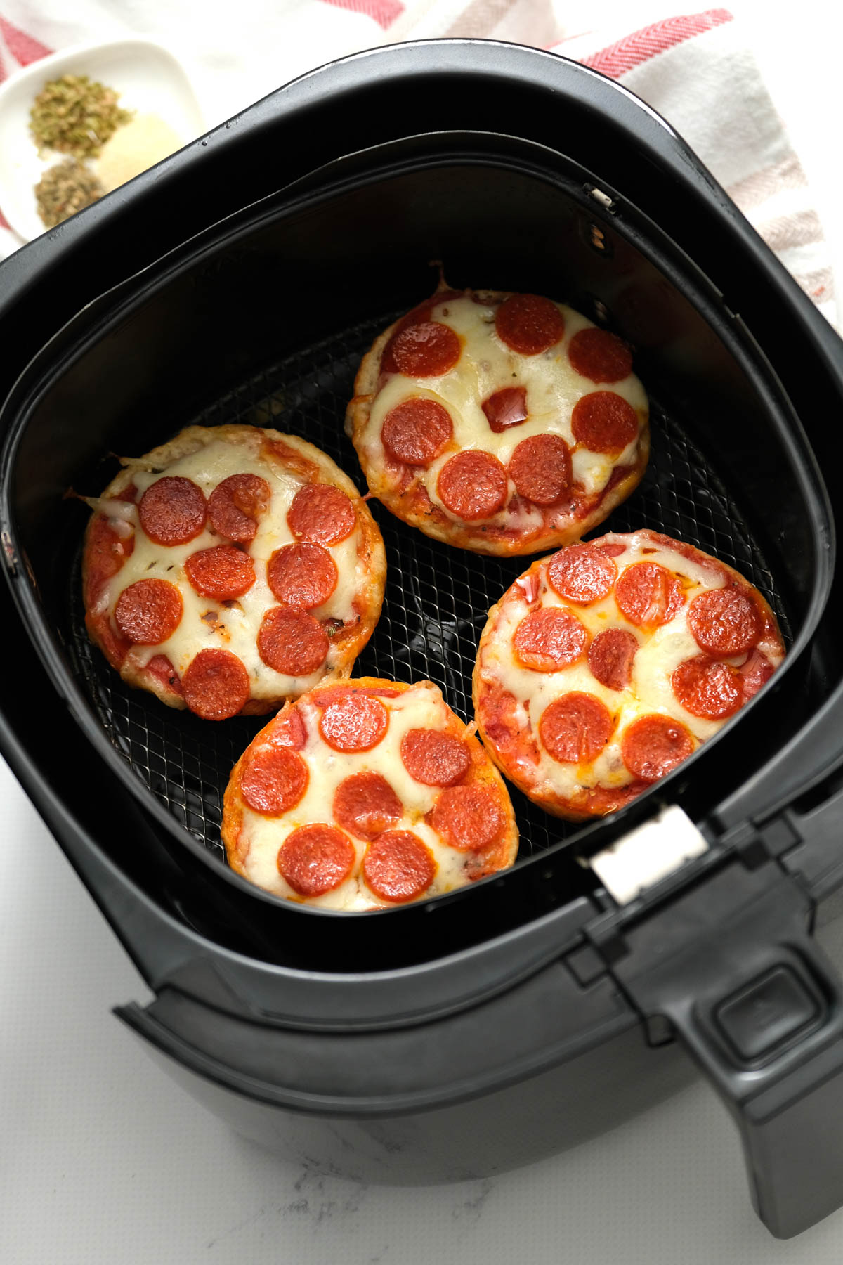 Air Fryer Bagel Bites in basket.