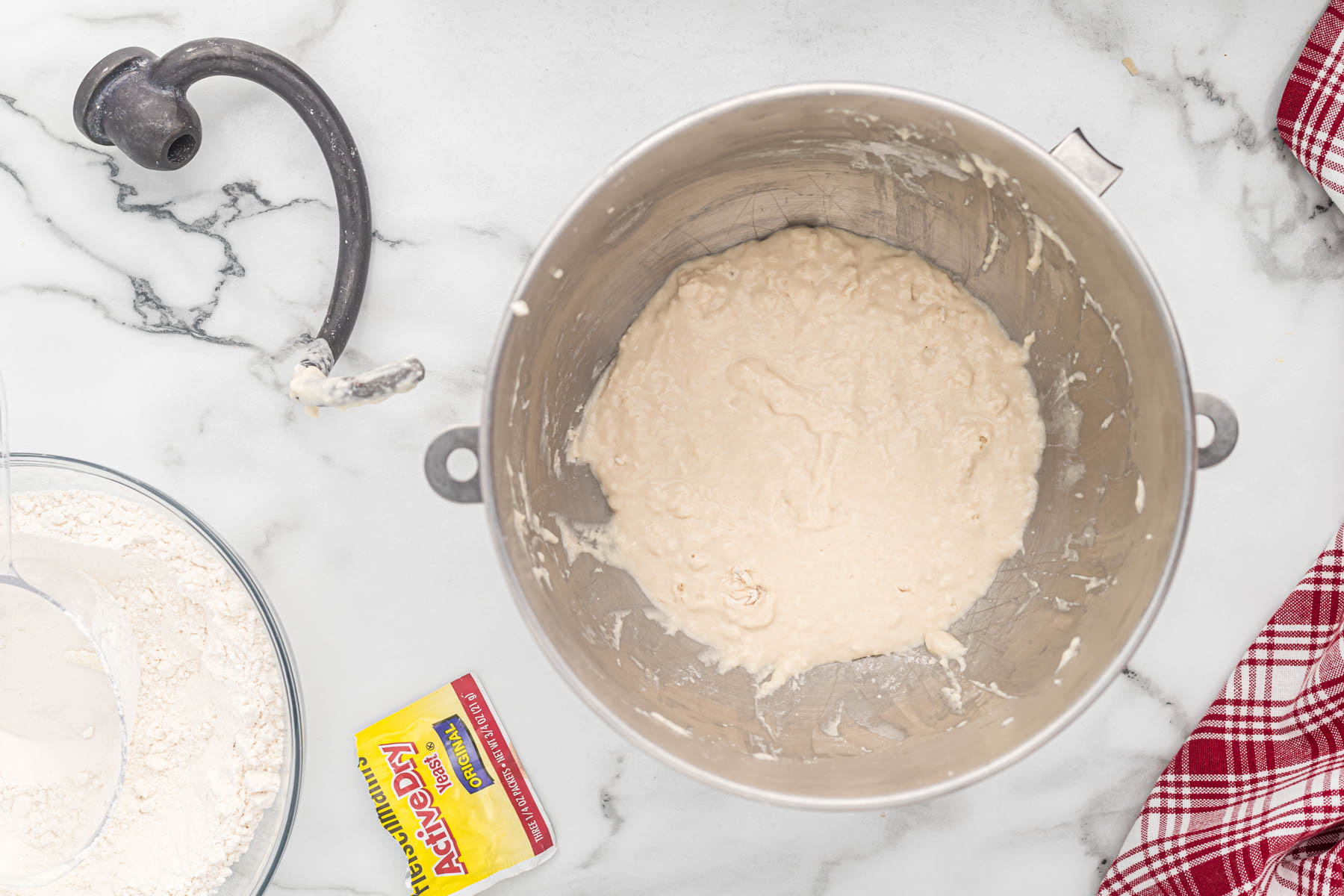 wet dough mixed in mixing bowl.