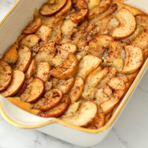 apple cobbler in white dish.