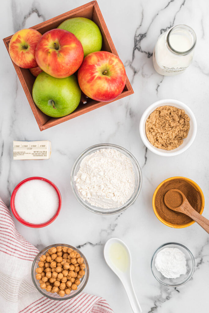 caramel apple cobbler ingredients on white background.