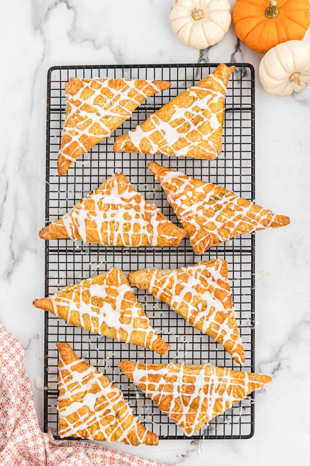 easy air fryer pumpkin turnovers on cooling rack.